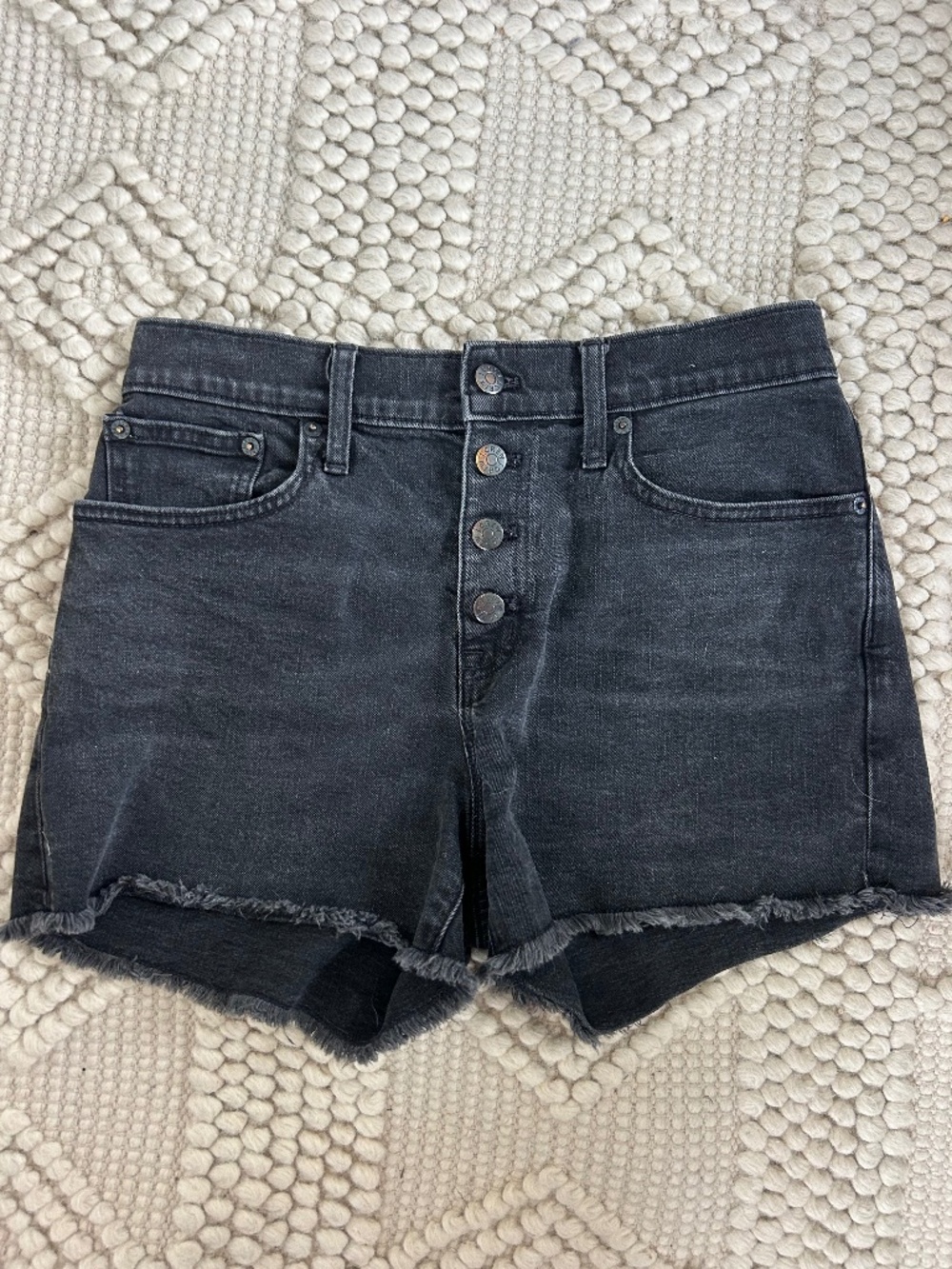 Black denim shorts